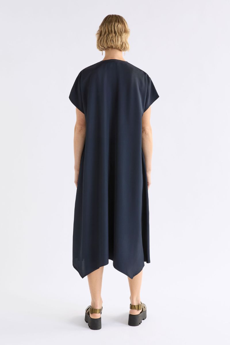 Person wearing Hullu dark blue dress back view on a white background