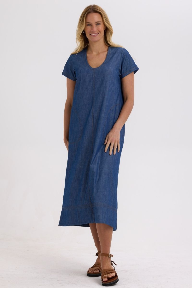 Woman wearing a blue dress on a white background
