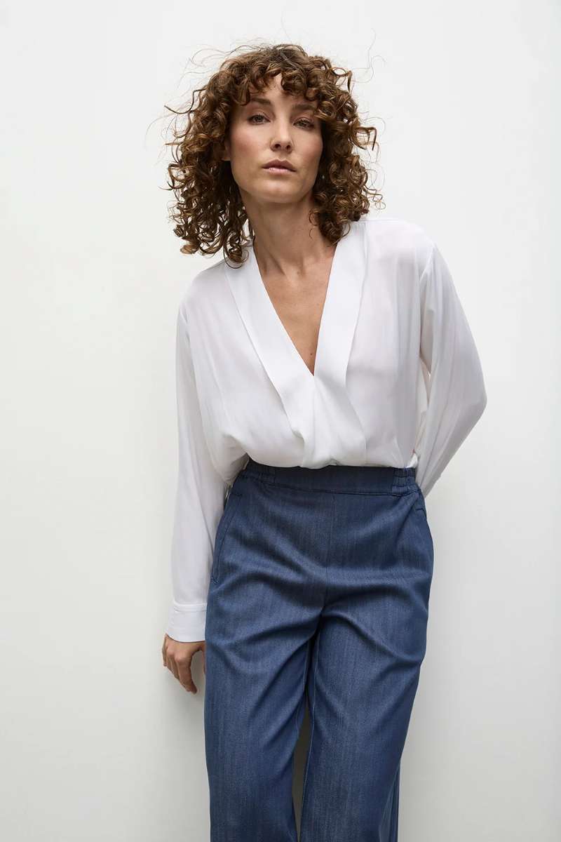 Woman wearing Mela Purdie Ribbon Edge Shirt F67 8627 against white background