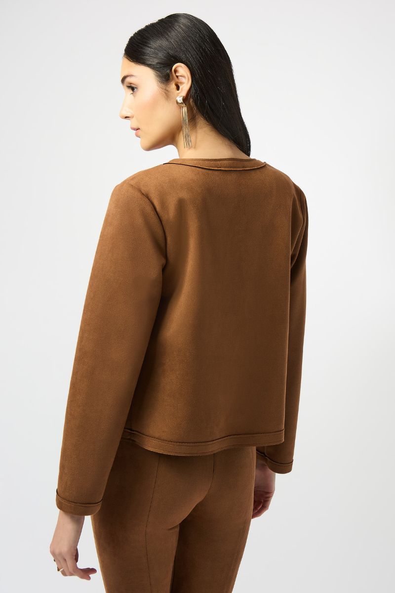 Back view of Woman wearing a brown outfit on a white background
