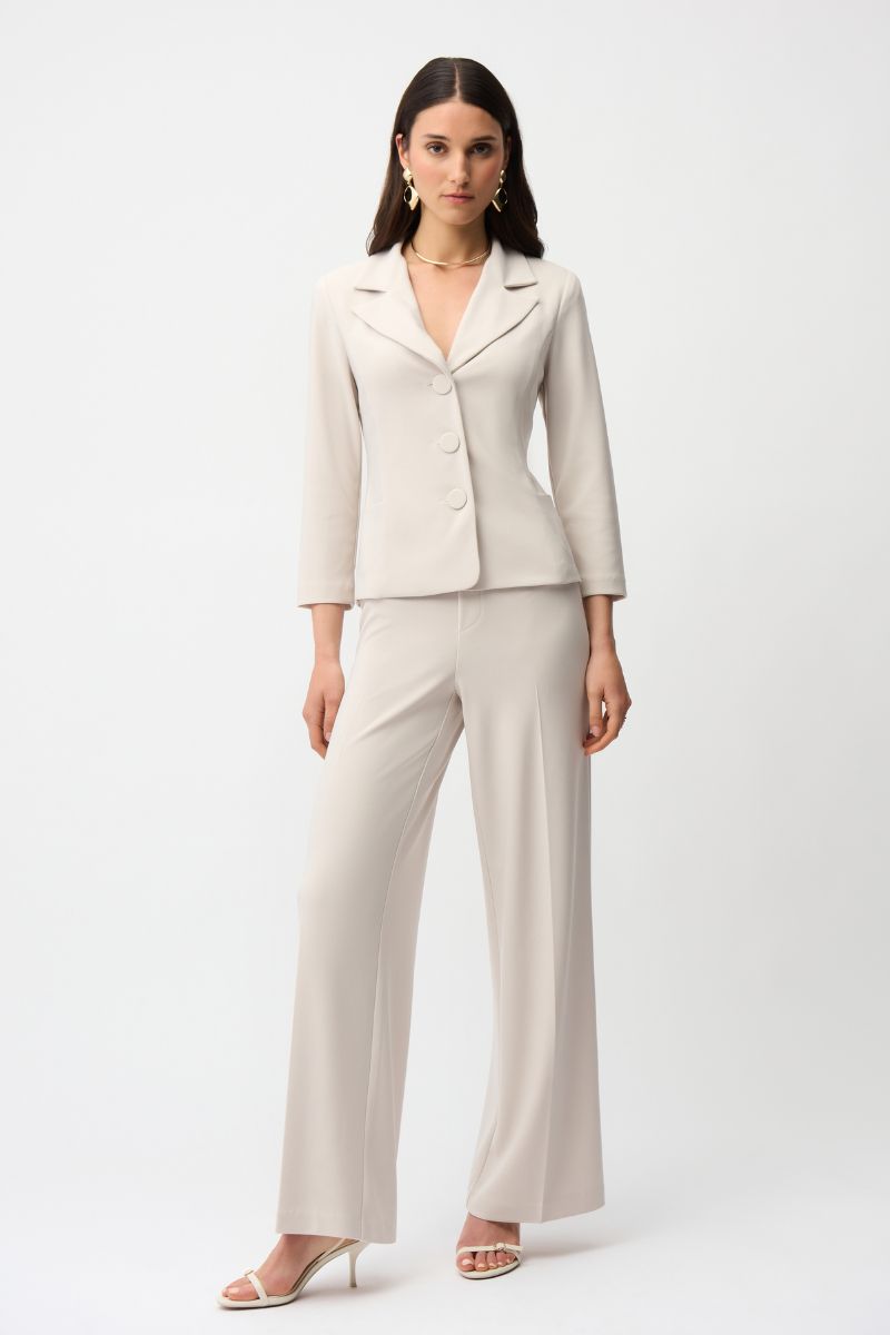 Woman wearing Joseph Ribkoff 261020 Silky Knit Fitted Blazer with Shawl Collar styled outfit view in Moonstone