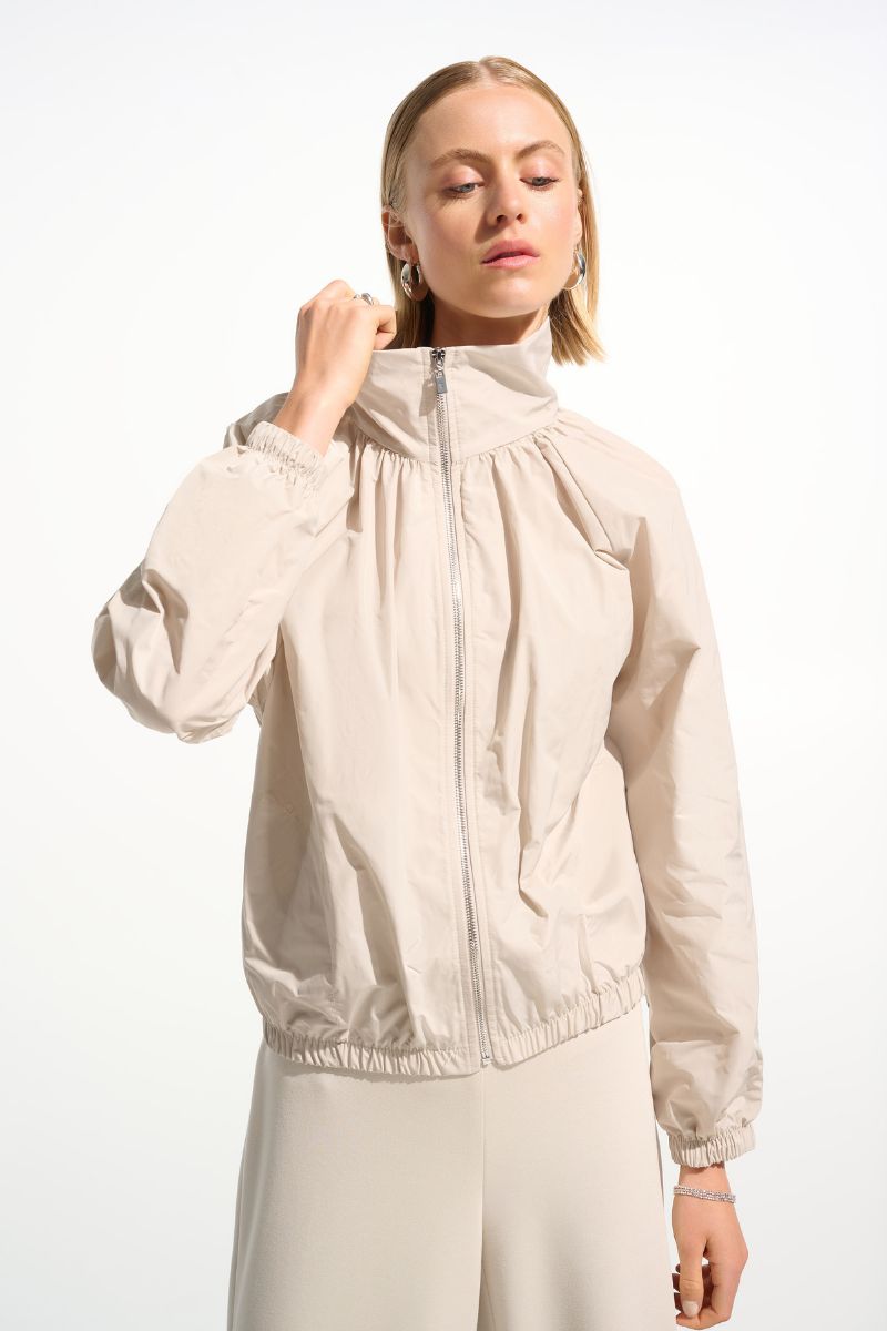 Woman wearing Joseph Ribkoff 261613 Memory Cocoon Outdoor Jacket in Moonstone front view