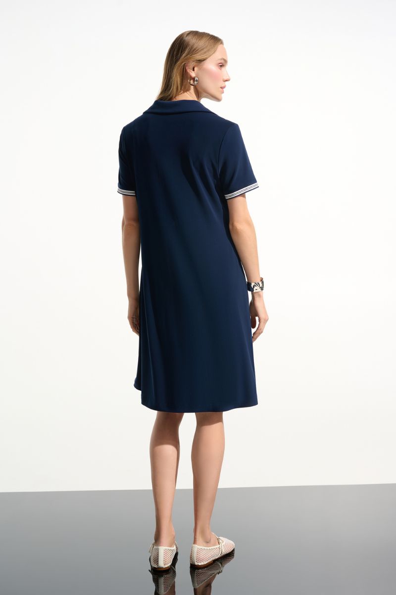 Woman wearing Joseph Ribkoff 261614 Silky Knit Trapeze Dress with Polo Collar in Indigo back view