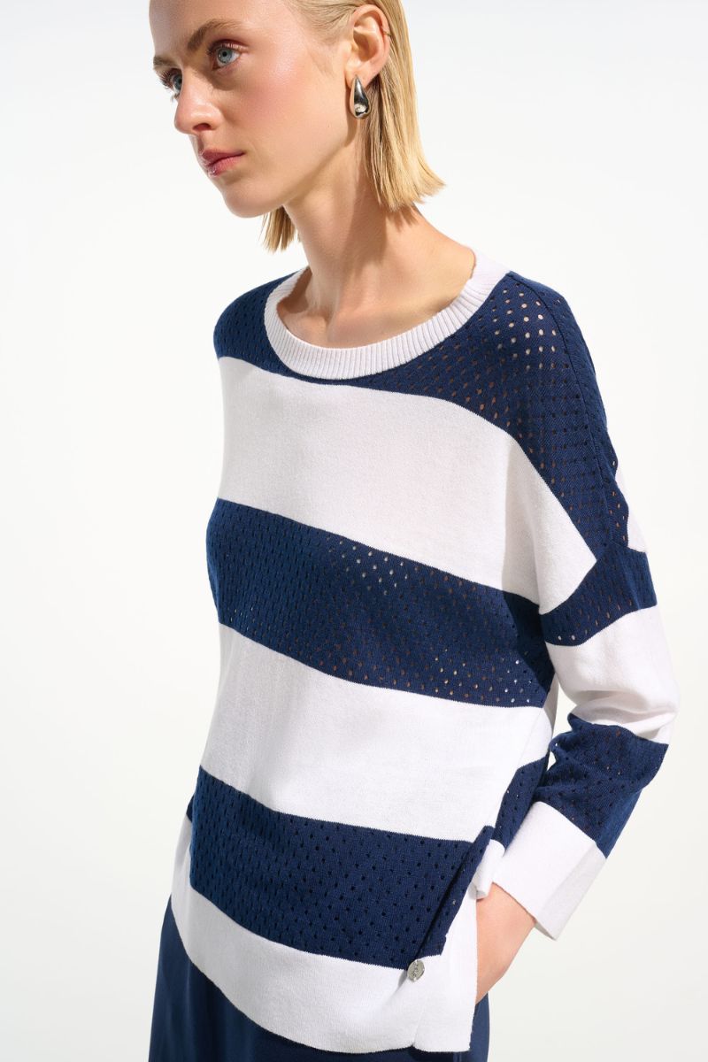 Woman wearing Joseph Ribkoff 261635 Cotton Blend Stripe Print Crewneck Sweater fabric close-up in Indigo Vanilla Stripe