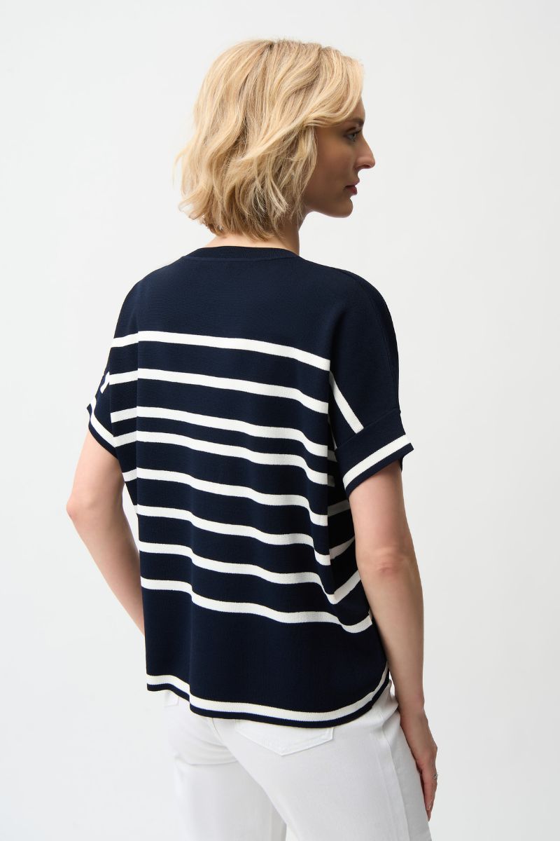 Woman wearing Joseph Ribkoff 261921 Viscose Blend Stripe Print Short Sleeve Sweater in Navy and Vanilla Stripe back view