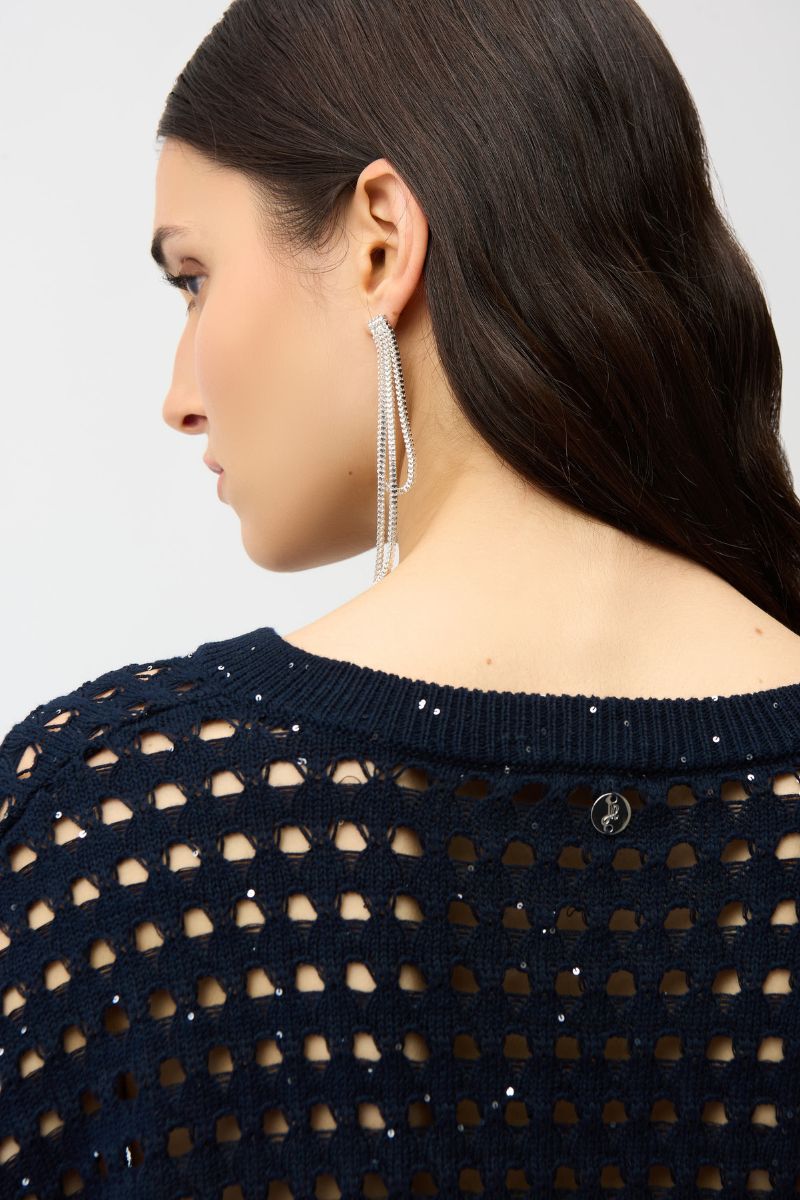 Woman wearing Joseph Ribkoff 261925 Cotton Blend Open Stitch Boxy Sweater fabric close-up in Midnight Blue