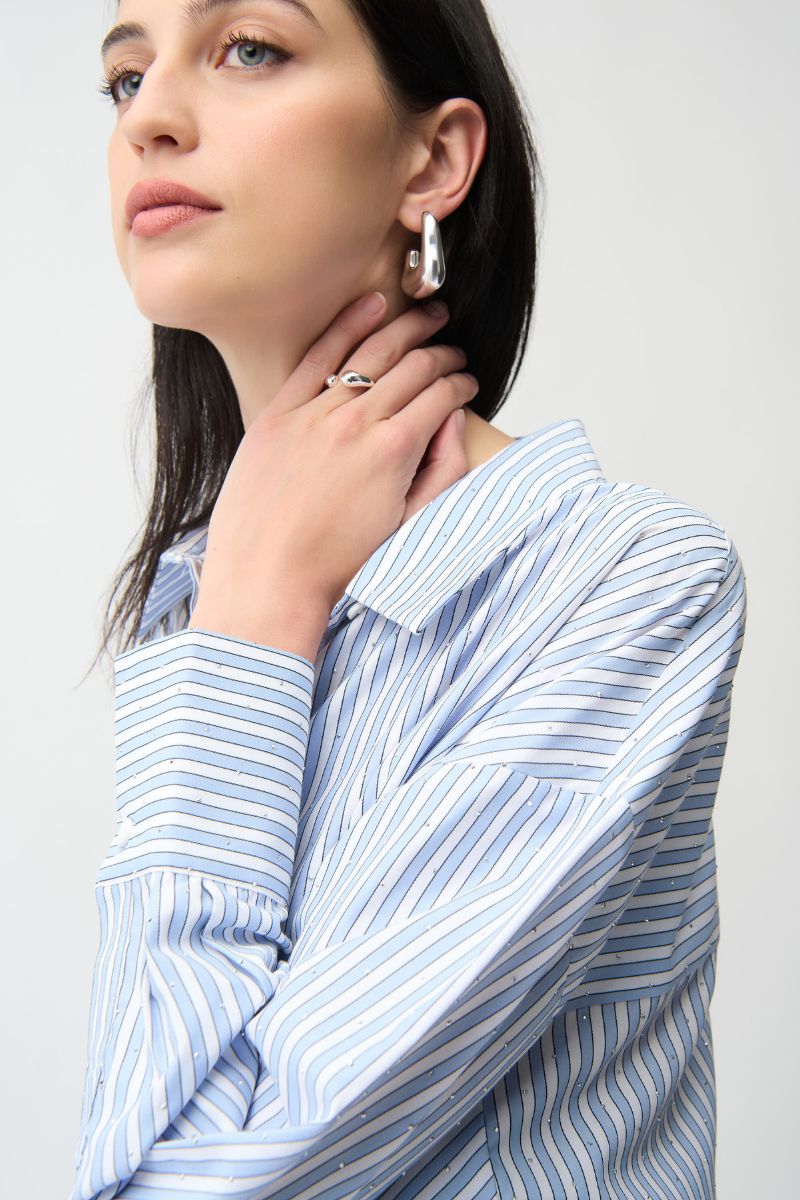 Woman wearing Joseph Ribkoff 261931 Tencel Stripe Print Boxy Blouse fabric close-up in Blue Vanilla Stripe