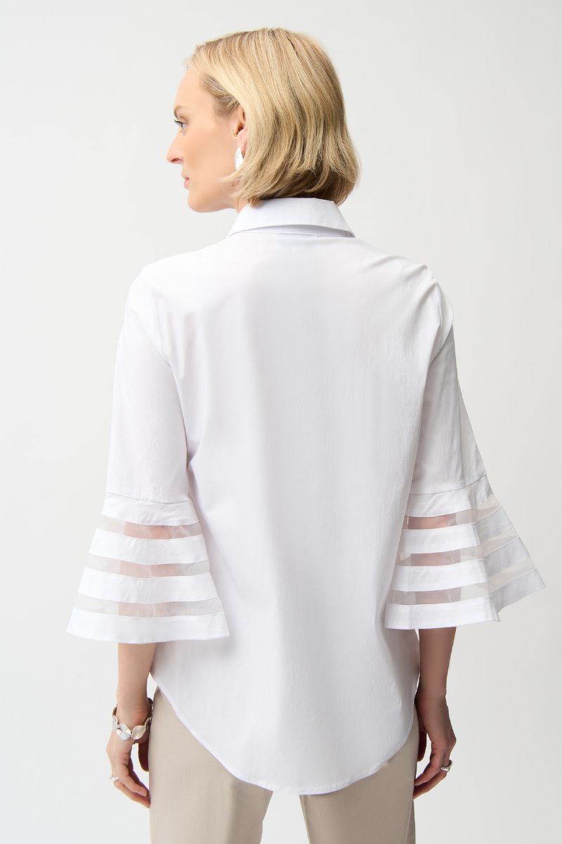 Woman wearing Joseph Ribkoff 261933 Stretch Poplin Straight Blouse with Organza Bell Sleeves in White back view