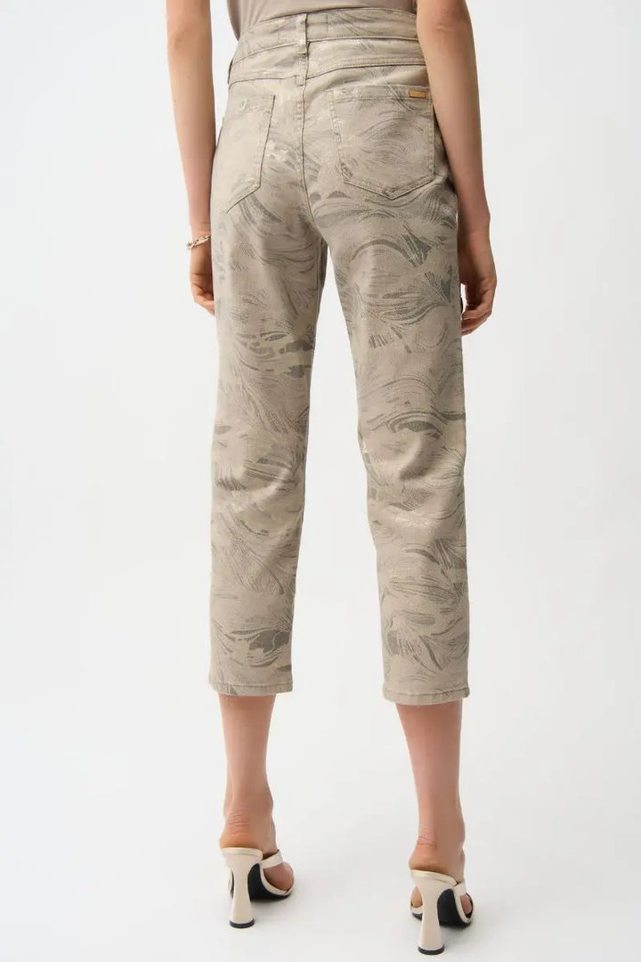 Woman wearing Joseph Ribkoff 261959 Metallic Abstract Print Slim Crop Jeans Gold Taupe back view