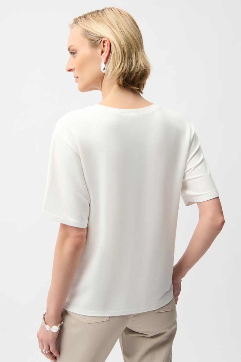 Woman wearing Joseph Ribkoff 261967 Front Print Straight T-Shirt with Rhinestones in Vanilla beige back view
