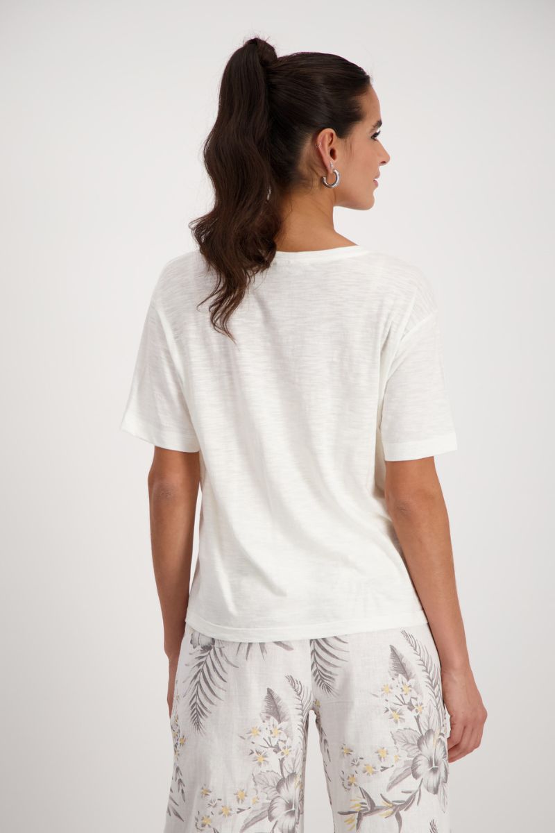 Woman wearing Monari 408663 Gemstone Appliqué Cotton Viscose T-Shirt in Off-White back view