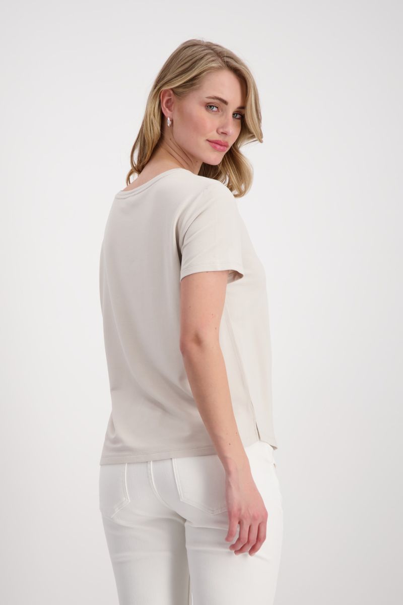 Woman wearing Monari 408680MNR EcoVero Jewellery Print T-Shirt in Light Sand back view
