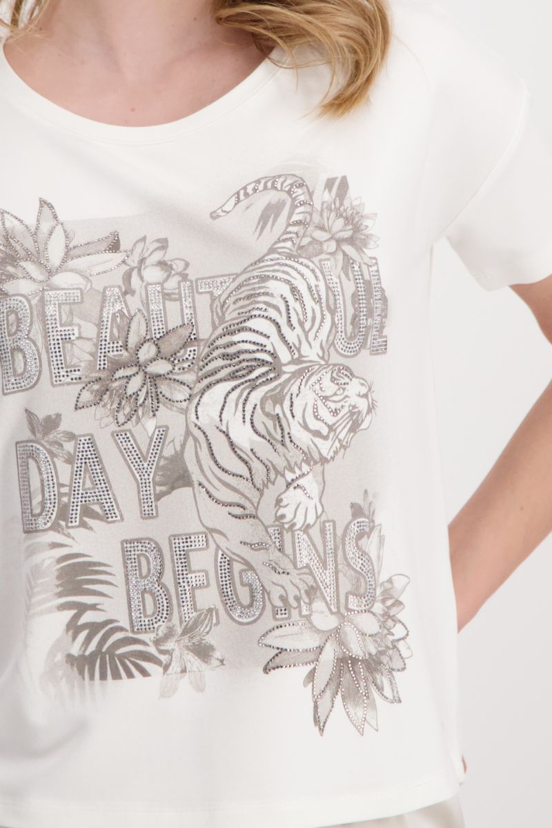 Woman wearing Monari 408781MNR tiger print rhinestone T-shirt print detail in off white