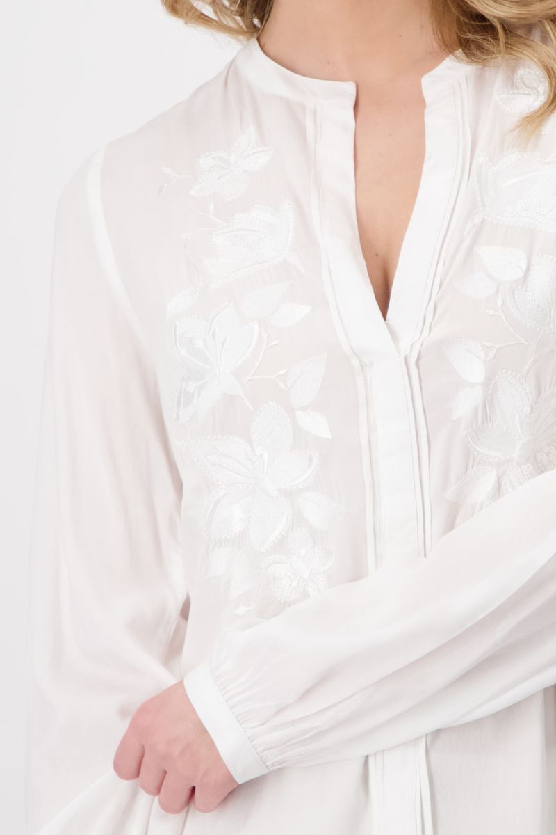 Woman wearing Monari 408761MNR White Embroidered Blouse embroidery detail
