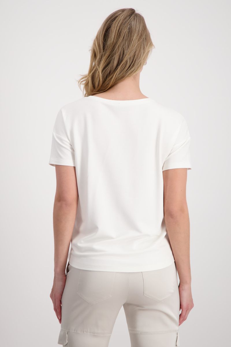 Woman wearing Monari 408781MNR tiger print rhinestone T-shirt in off white back view