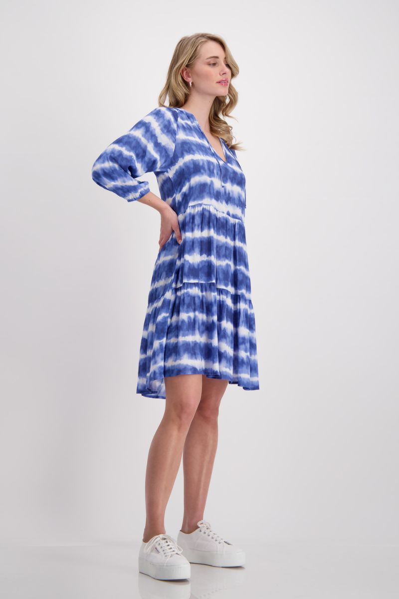 Woman wearing Monari 408856 Denim Blue Batik Stripe Dress side view