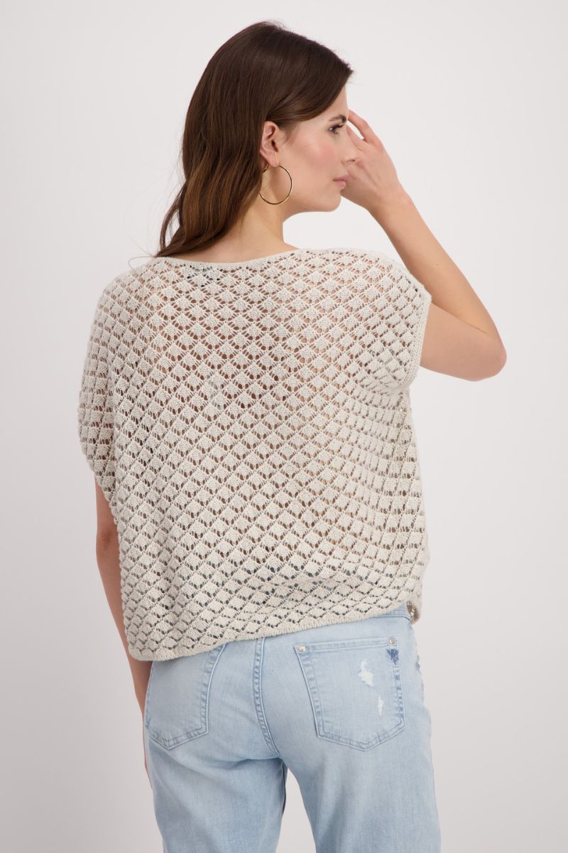 Woman wearing Monari 408902MNR ajour knit sweater with mini gemstones in sand back view
