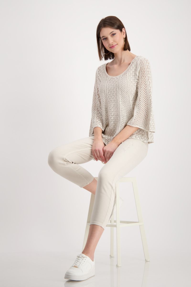 Woman wearing Monari 408907MNR mesh jewellery sweater styled outfit view in sand