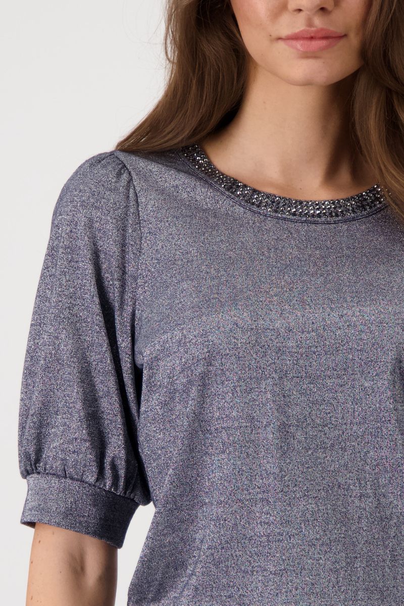 Woman wearing Monari 409080MNR Viscose Lurex Embellished T-Shirt fabric close-up in Deep Ocean