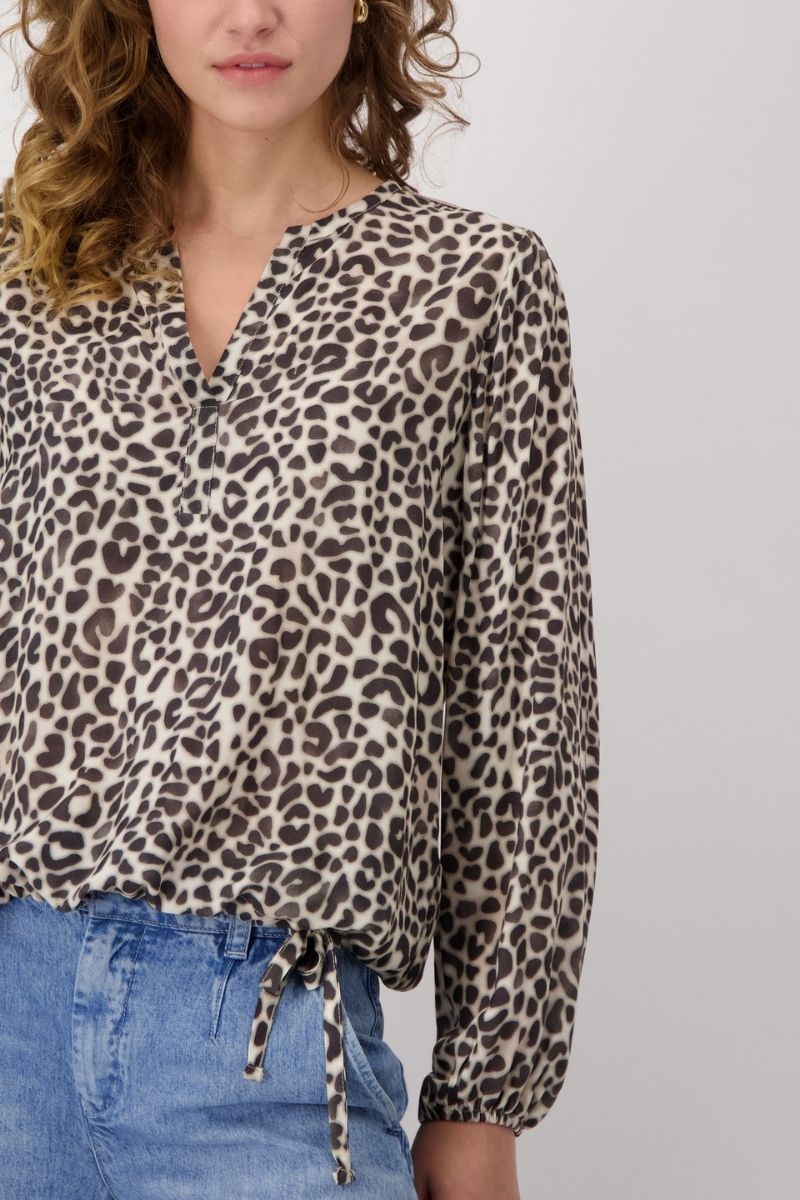 Woman wearing Monari 409202MNR Blouse All Over Leo Print sleeve detail