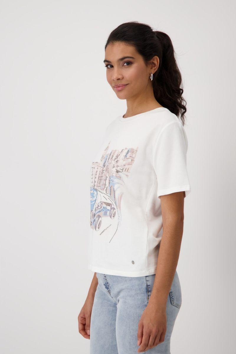 Woman wearing Monari 409432MNR Monaco Print T-Shirt side view in Off White