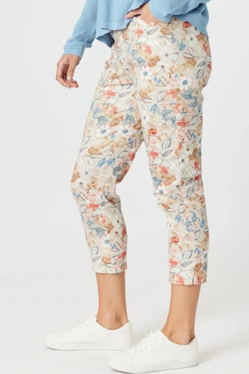 Side view of Floral-patterned pants worn by a person on a white background