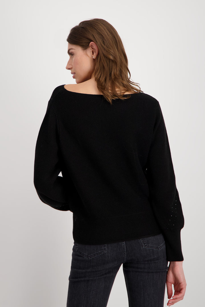 Pull à découpes avec strass 807602MNR en noir par Monari