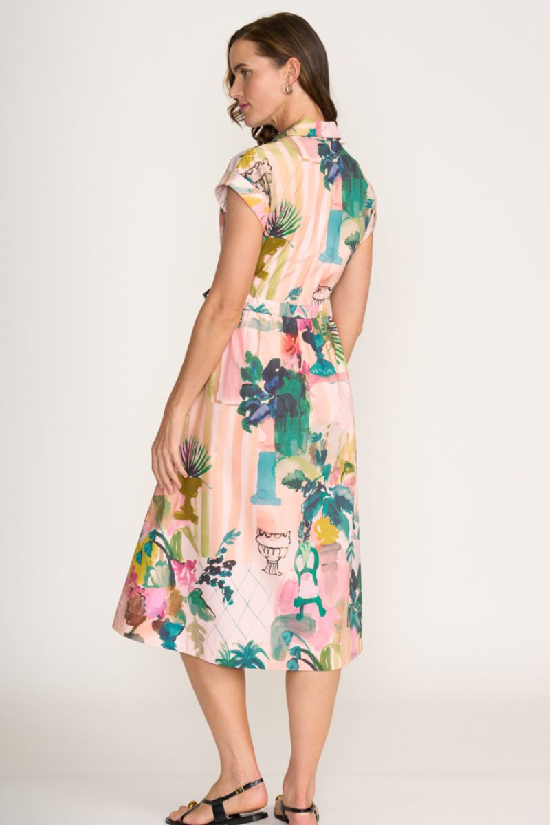 Woman wearing a floral dress on a white background