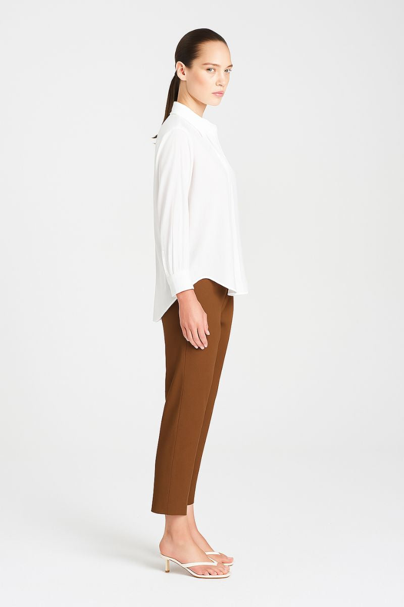 Woman wearing Mela Purdie F65 1478 Nomad Pant in Saddle side view