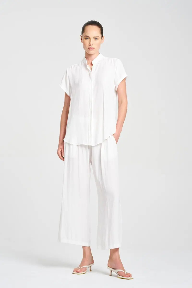 Woman wearing Mela Purdie F67 8629 Soft Stand Shirt in White fabric texture detail