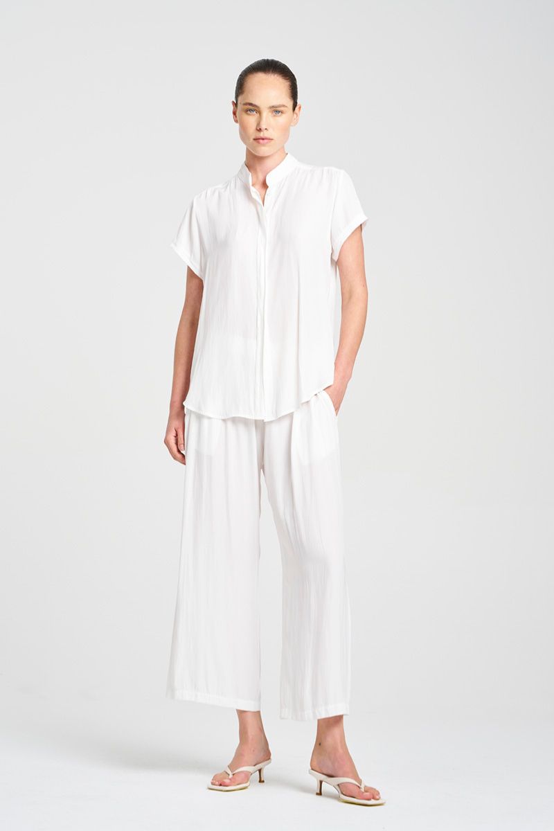 Woman wearing Mela Purdie F67 8629 Soft Stand Shirt in White fabric texture detail