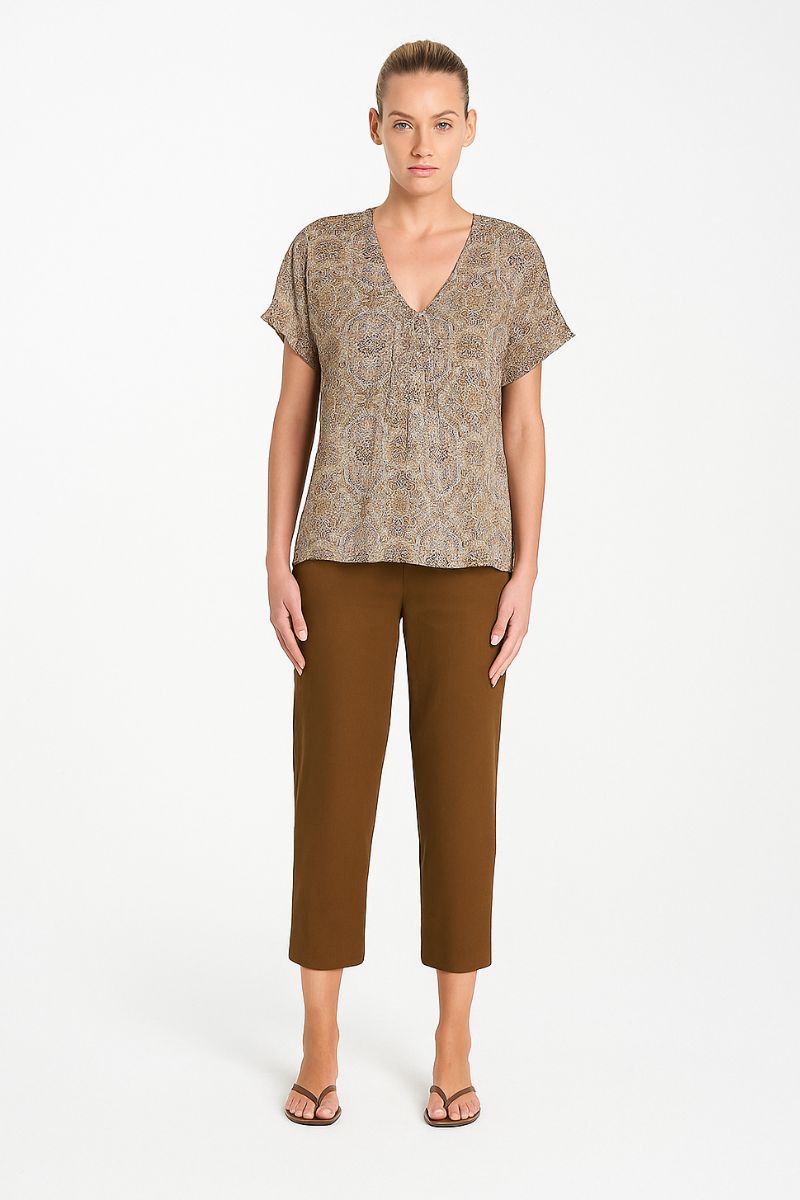 Woman wearing Mela Purdie F65 1478 Nomad Pant in Saddle tapered leg detail