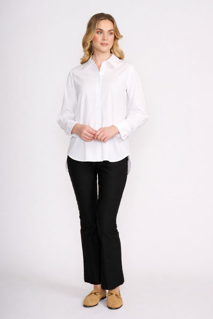 Woman wearing Push Up Shirt in White by FOIL FO8496 styled with black pant