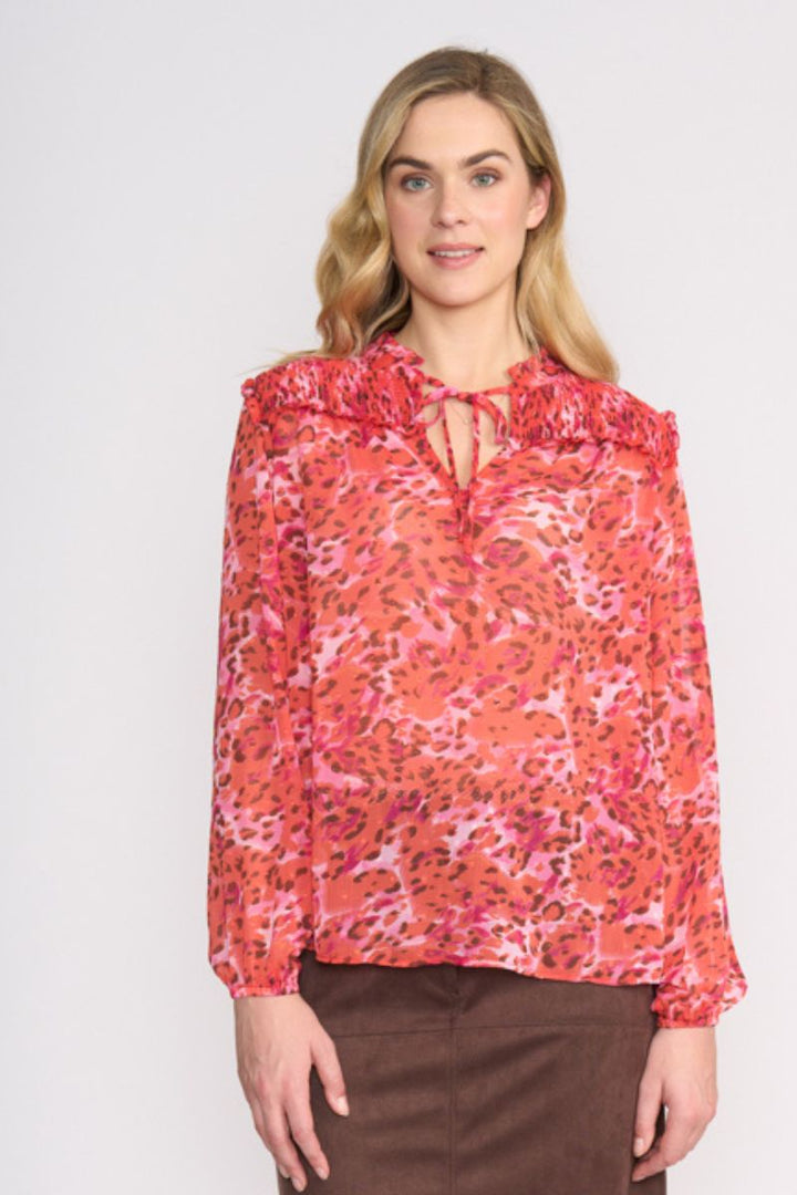 Woman wearing Stepping Out Blouse in Wild Life by FOIL FO8514 front view