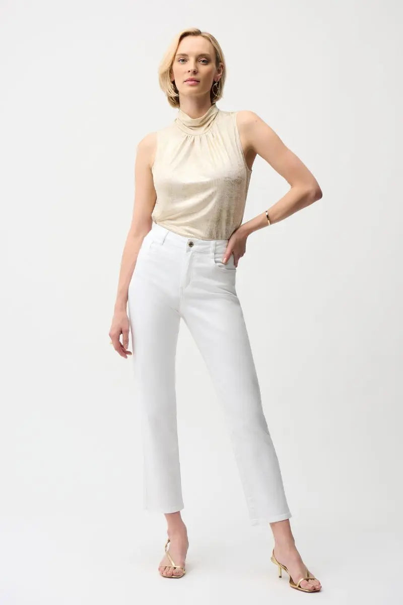 Woman wearing White Gia Jean and light gold Foiled Knit Straight Sleeveless Top by Joseph Ribkoff on a white Background