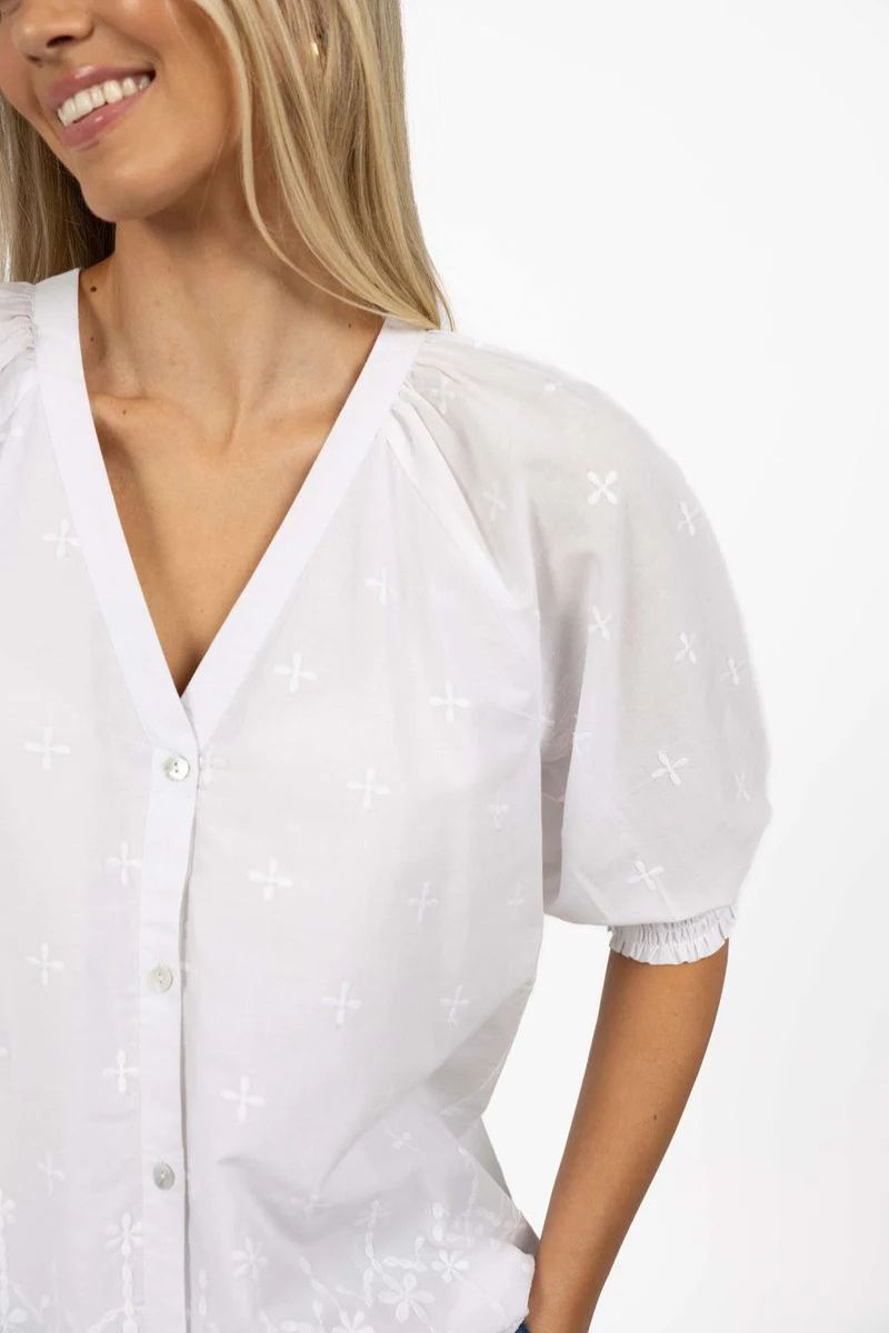Woman wearing Humidity Lifestyle HS25306 Chloe Blouse White neckline detail