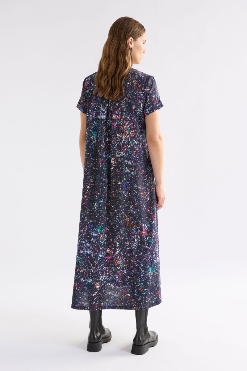 Woman wearing a floral dress on a white background