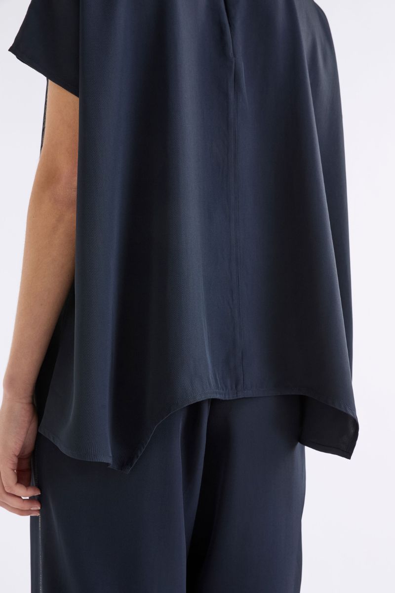 Navy blue top and pants on a white background