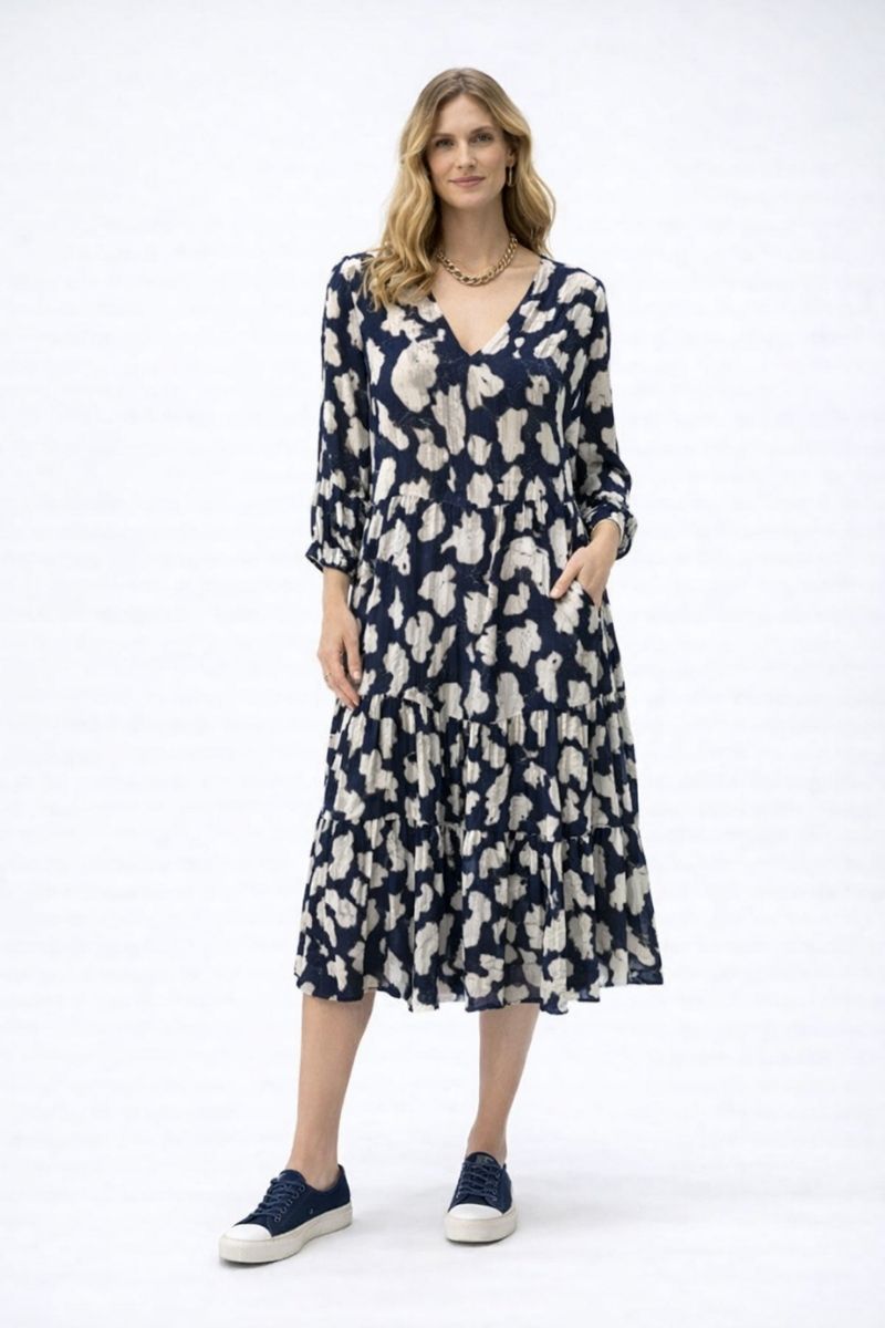 Woman wearing navy and off white 3/4 sleeve V neck midi dress by Dress Addict JOK0500-517 front view
