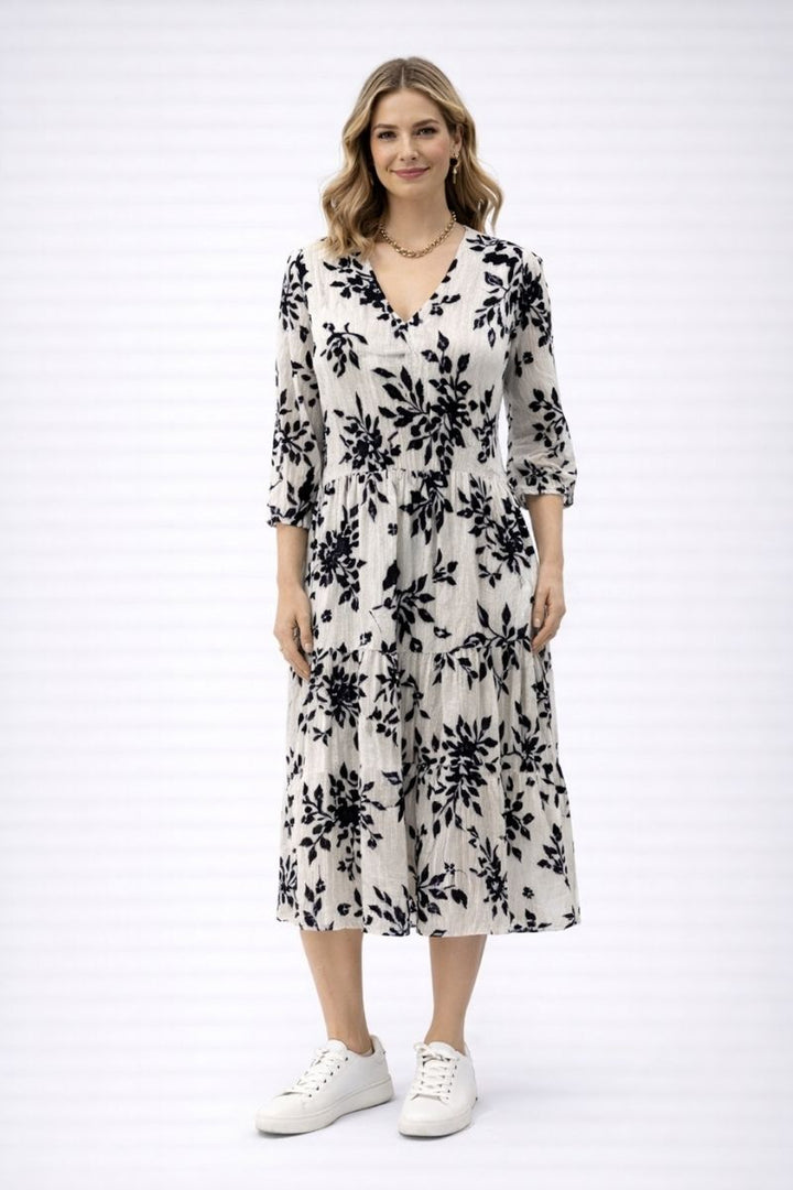 Woman wearing navy and white 3/4 sleeve V neck midi dress by Dress Addict JOK-5AK-5L front view