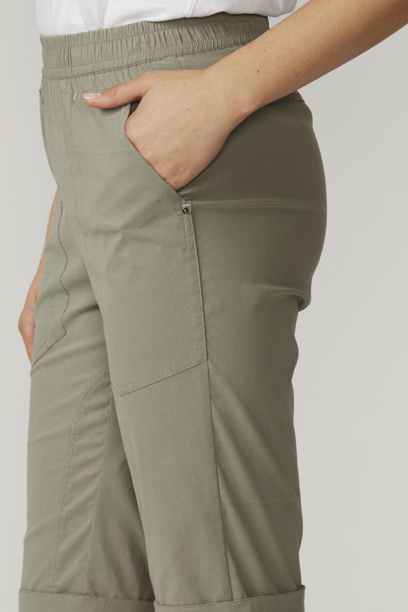 Side view of Olive green pants with a plain background