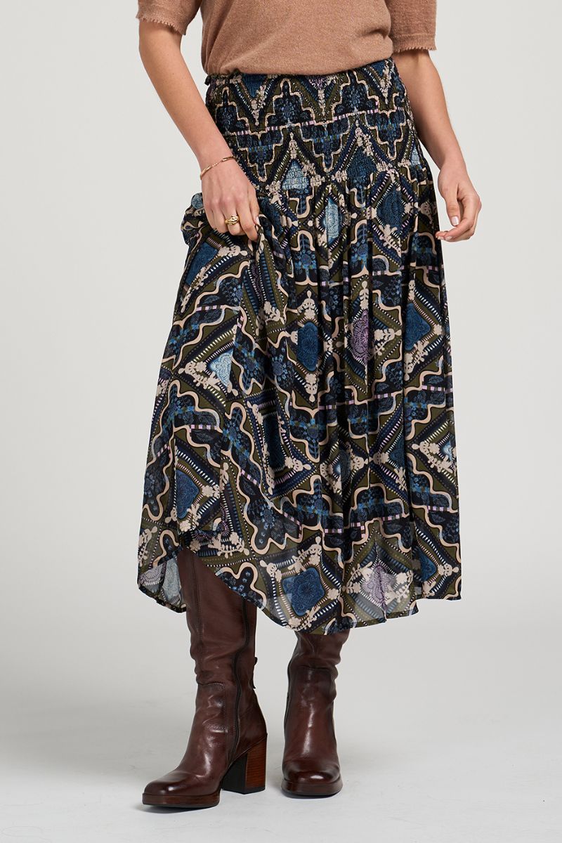 Woman wearing Loobies Story LS3201 sheer viscose skirt styled casually
