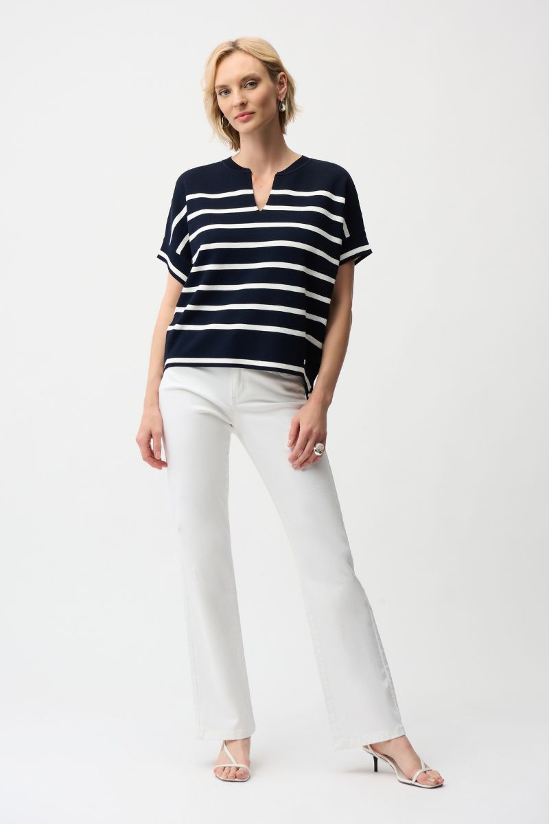 Woman wearing Joseph Ribkoff 261921 Viscose Blend Stripe Print Short Sleeve Sweater styled outfit view in Navy and Vanilla Stripe