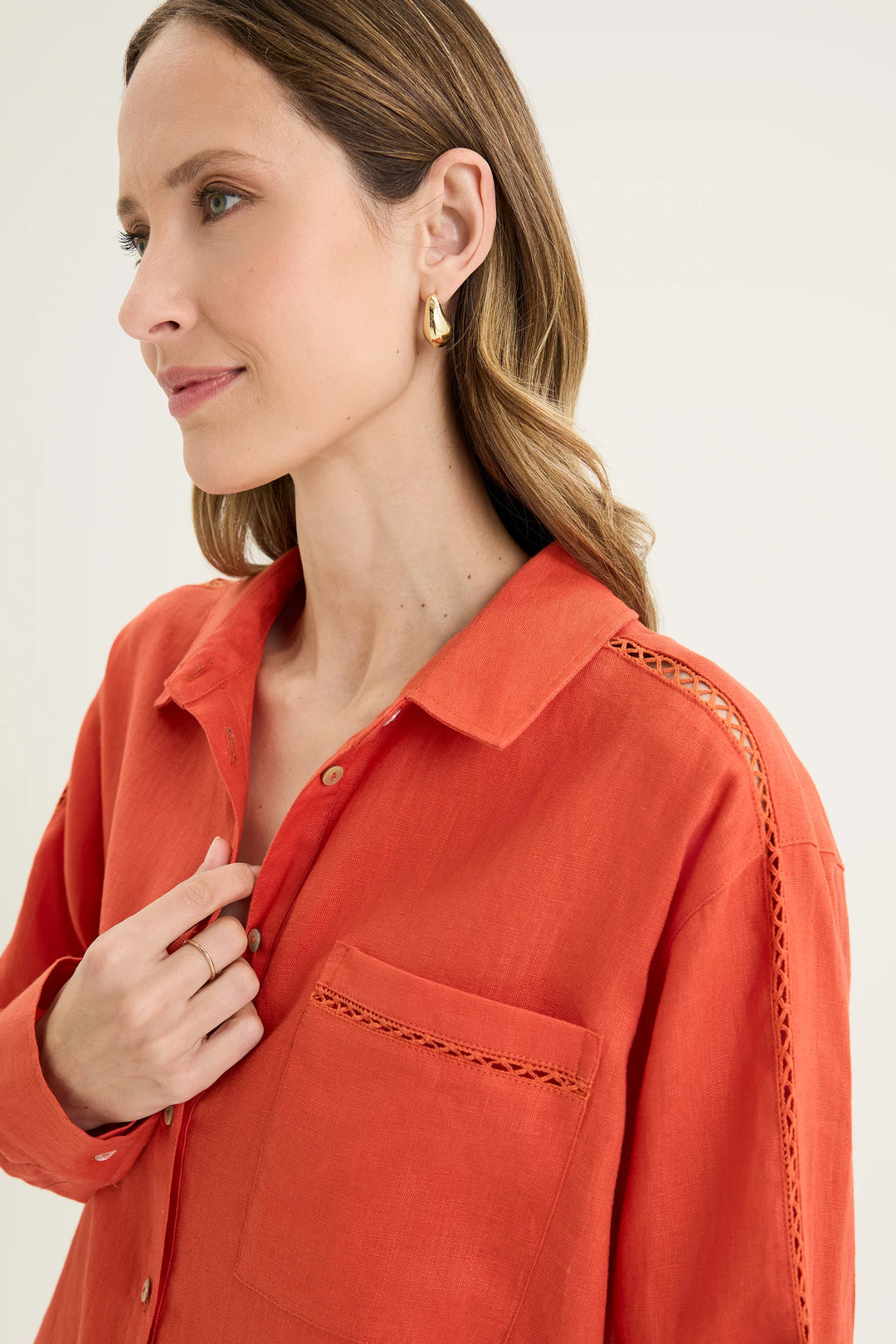 Detail view of woman wearing Yarra Trail Tirari Shirt in Volcanic YTWN4277