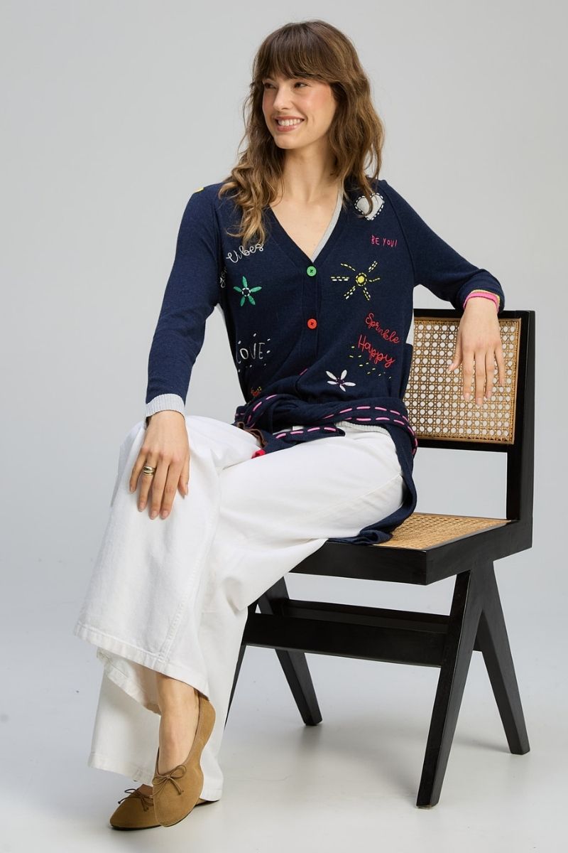 Woman wearing Good Energy Cardigan in Dark Denim by Zaket & Plover ZP8130 sleeve detail