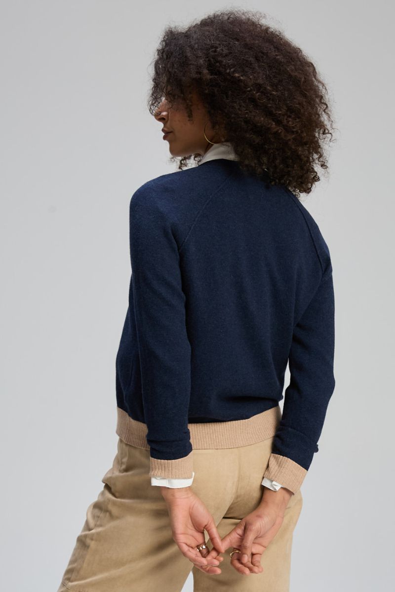 Woman wearing V Neck Essential Cardigan in Dark Denim by Zaket & Plover ZP8148 back view