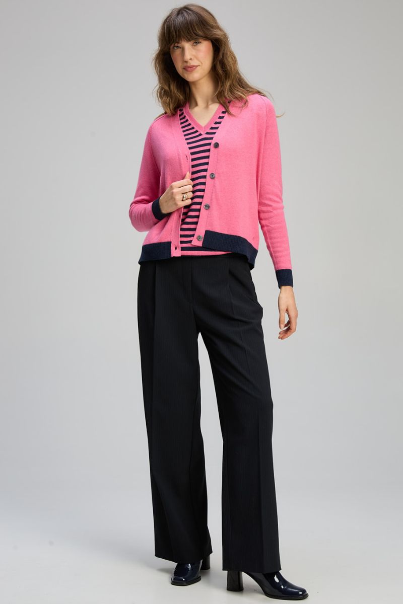 Woman wearing V Neck Essential Cardigan in Rhubarb by Zaket & Plover ZP8148 detail view