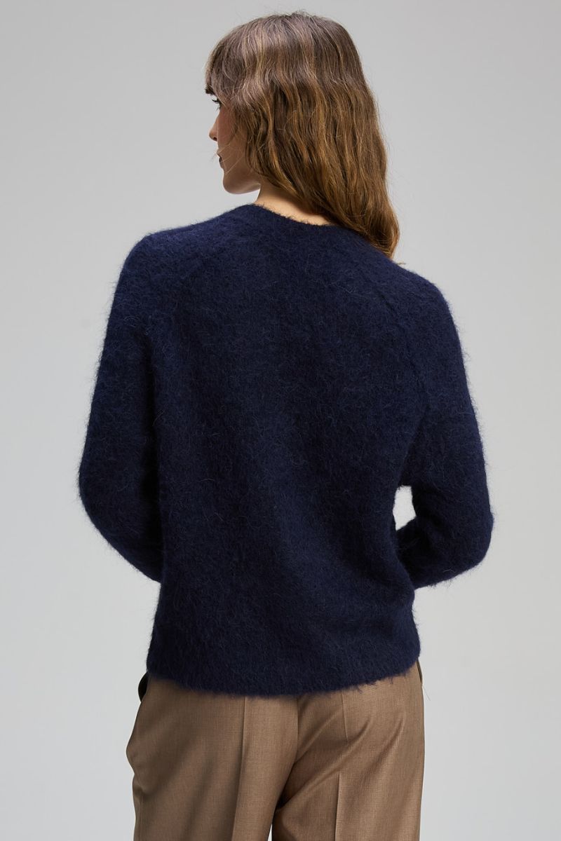 Woman wearing Alpaca Cardigan in Midnight by Zaket & Plover ZP8110 back view
