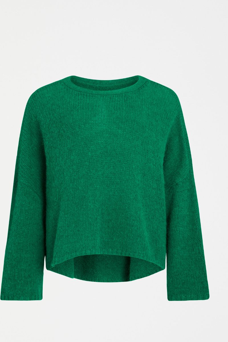 Green sweater on a white background
