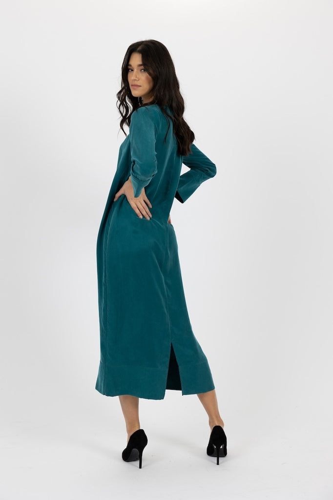 aubrey-dress-in-teal-humidity-lifestyle-back-view_1200x